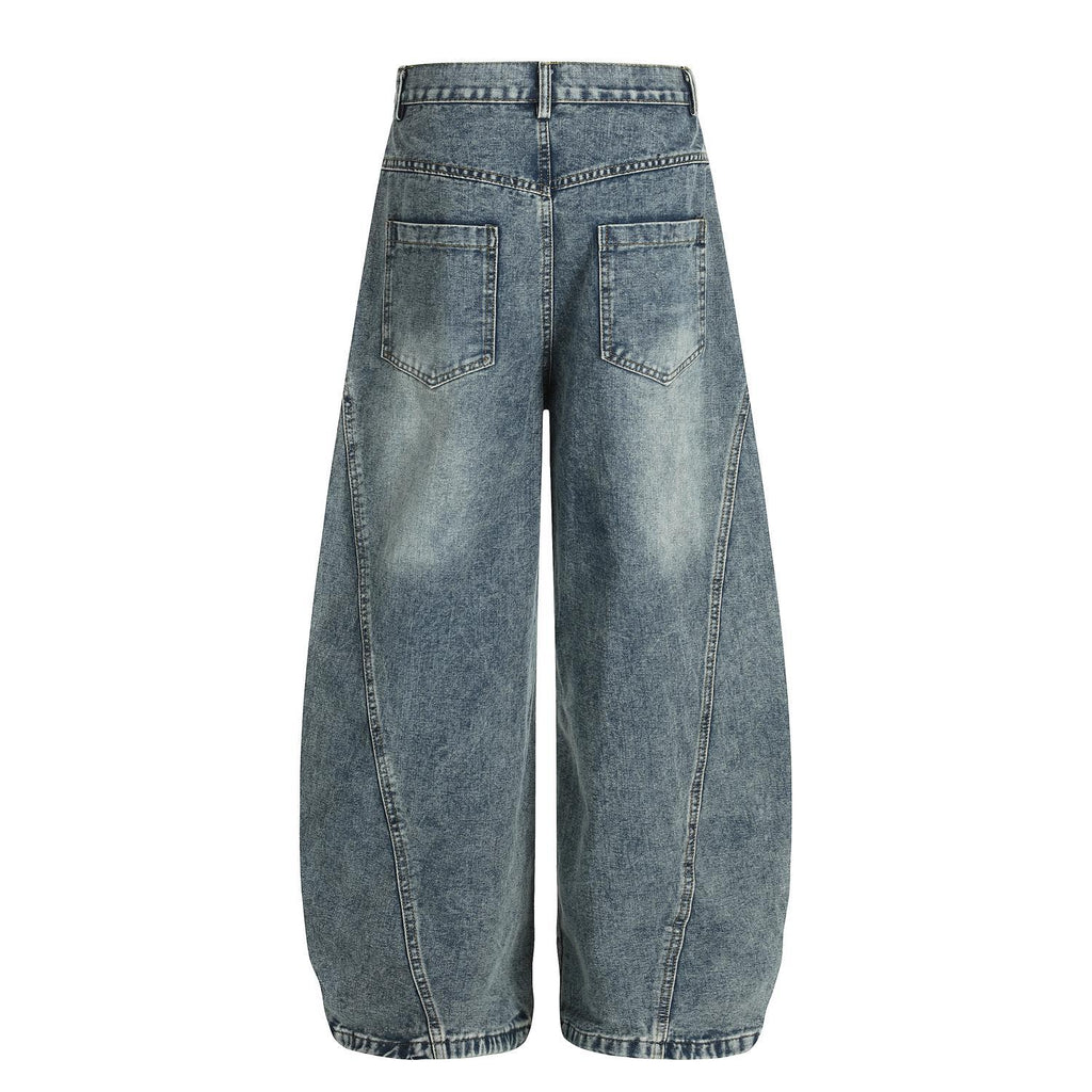 Embroidered puppy baggy curved knife jeans