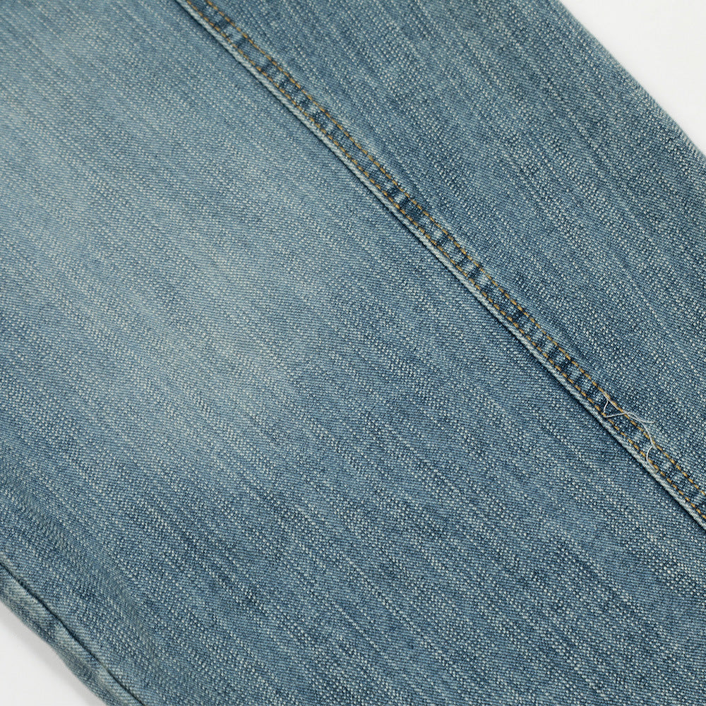 Washed curved knife jeans